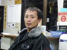 塚越業務部長